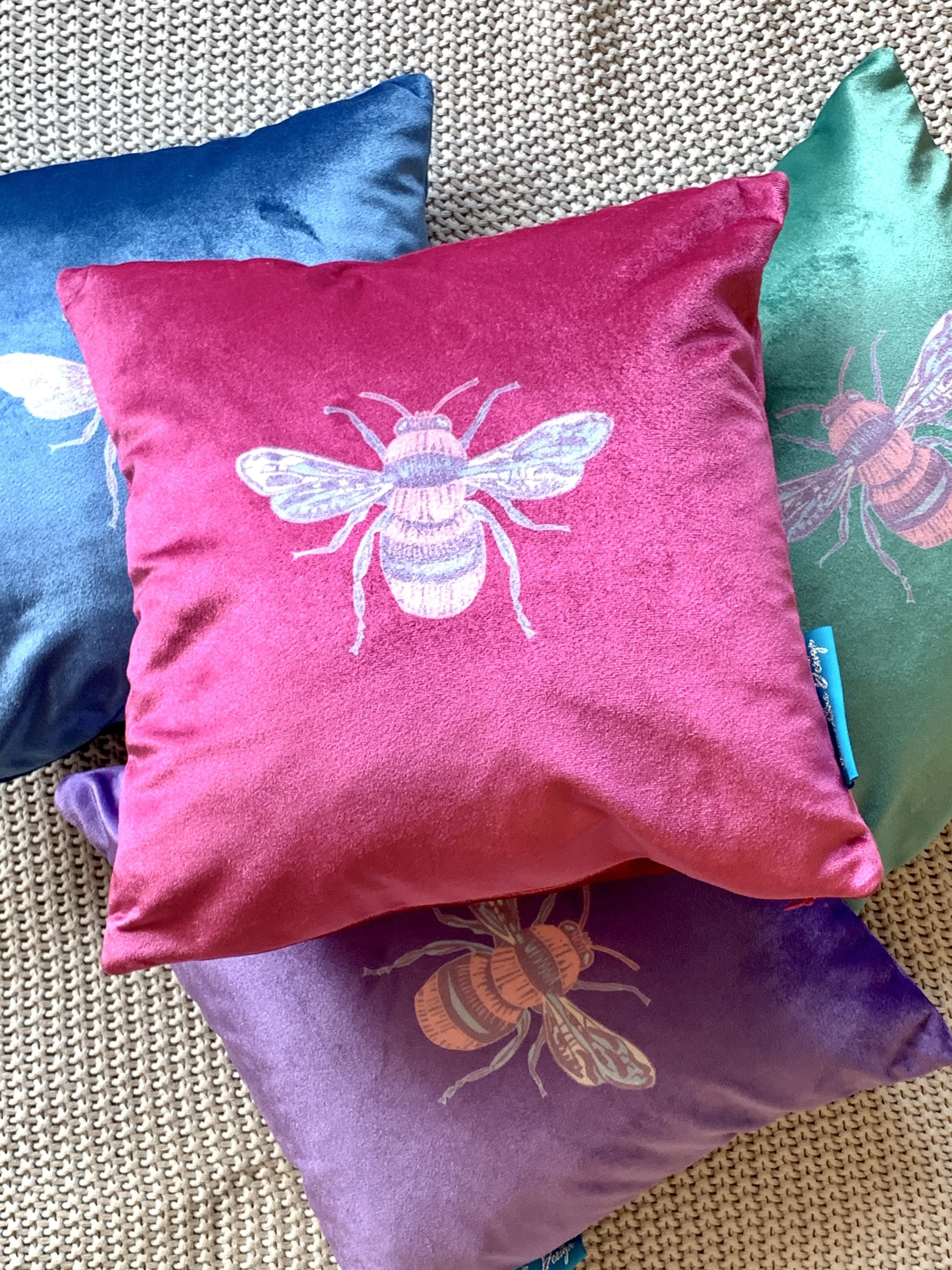 Jewel coloured velvet cushions top